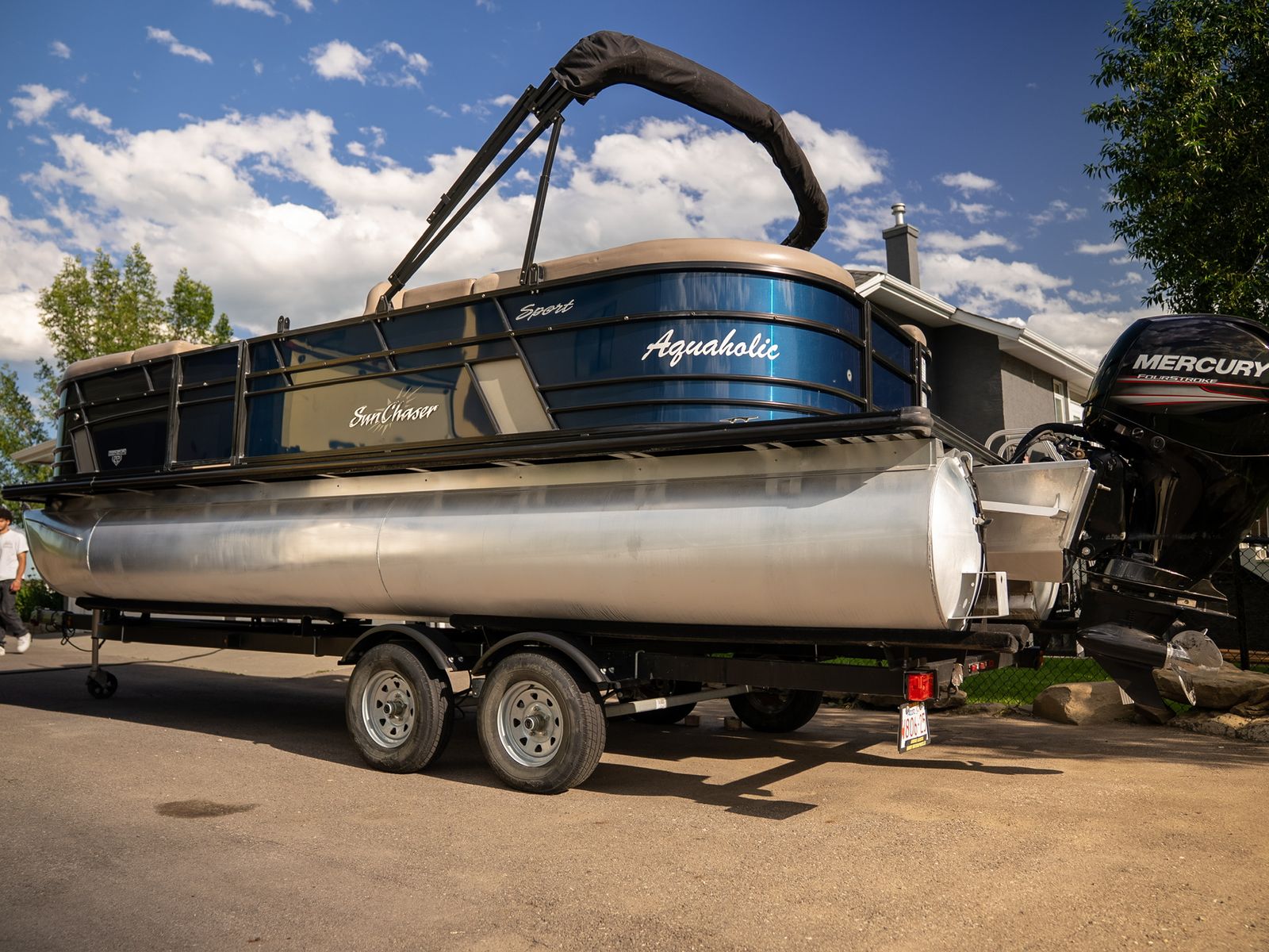SunChaser pontoon boat on its trailer after exterior detail
