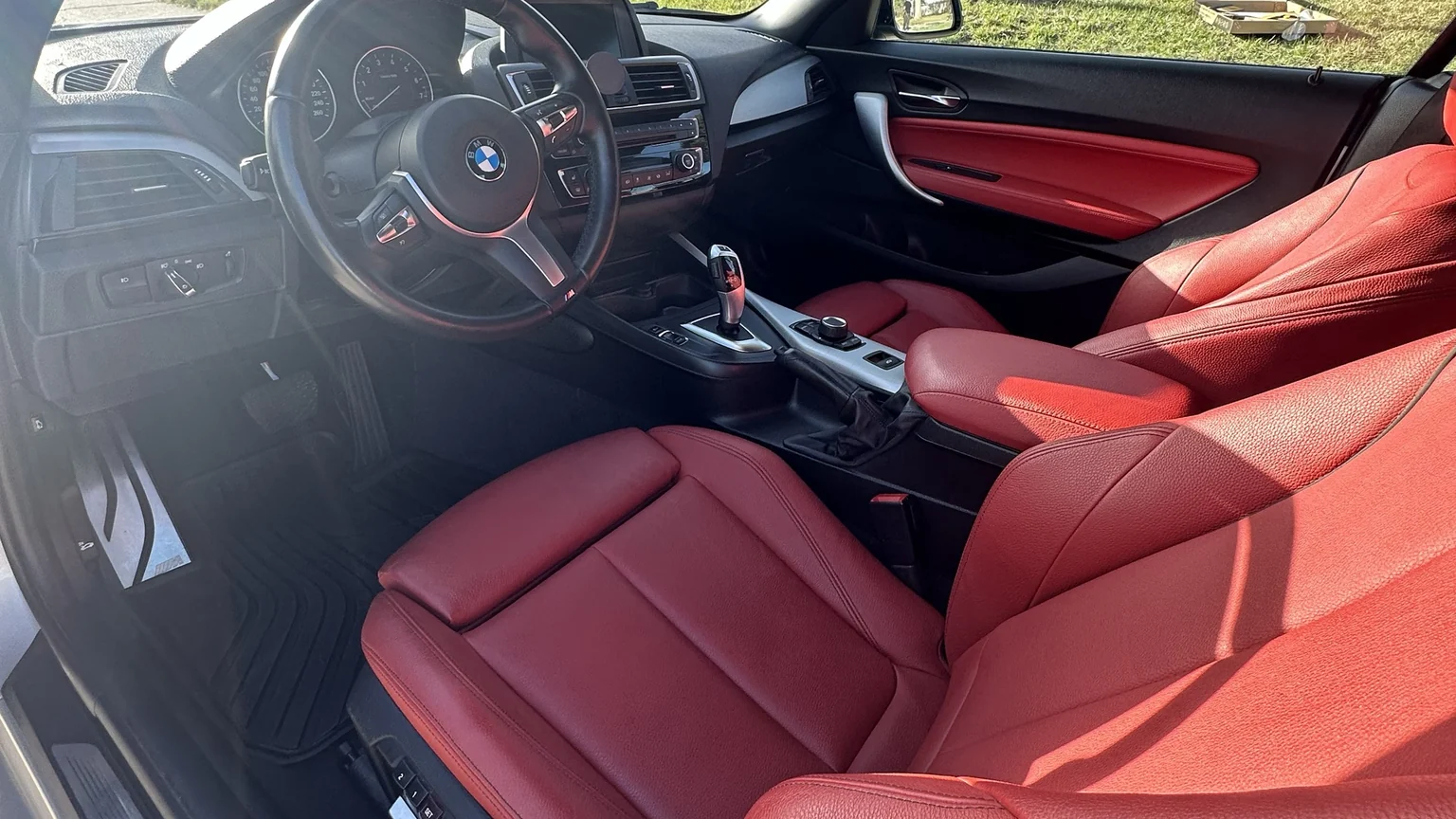 BMW red leather cabin after a deep interior detail